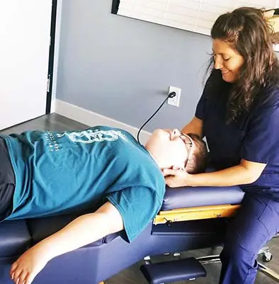 Chiropractor Simi Valley CA Dr. Heather Valinsky with Child Patient