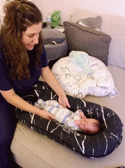 Chiropractor Los Angeles CA Heather Valinsky Adjusting Infant